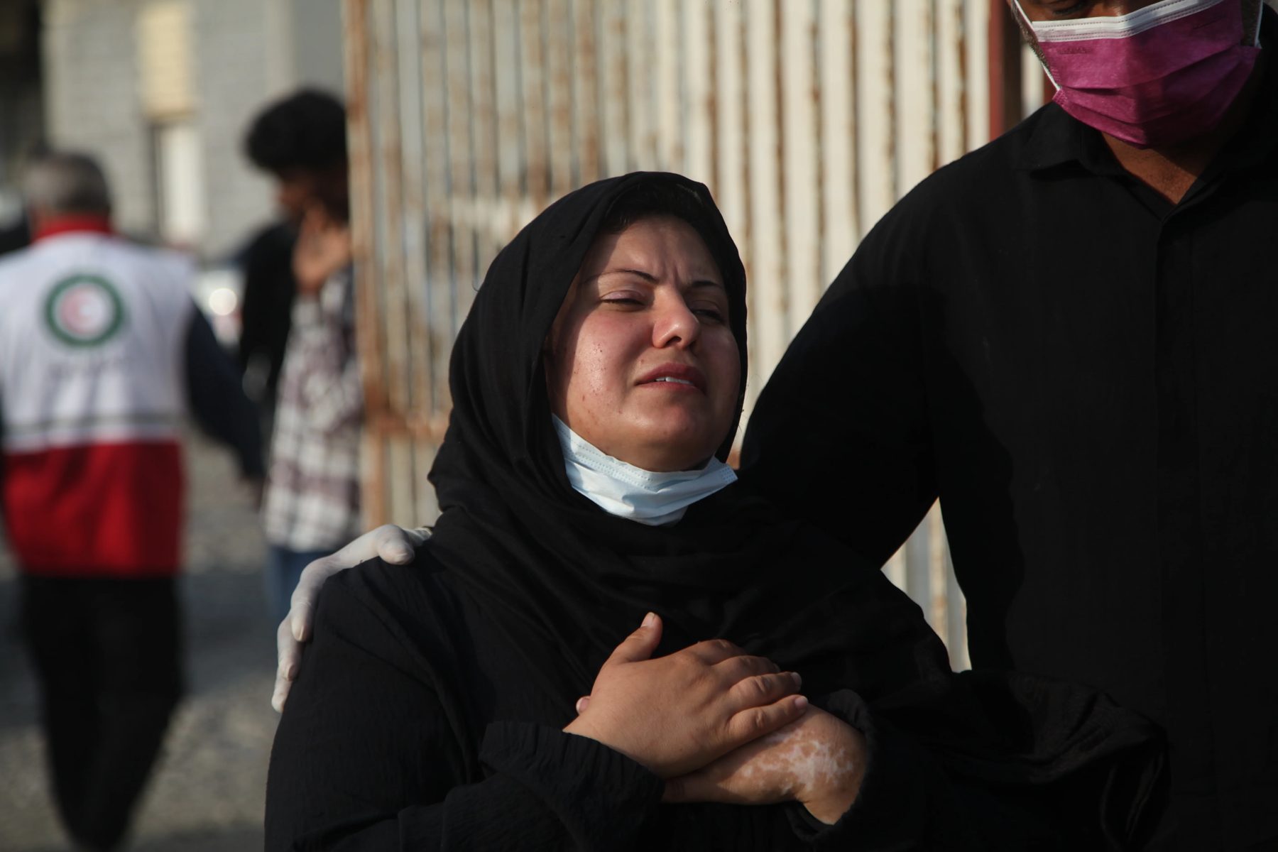 A woman weeping at the site